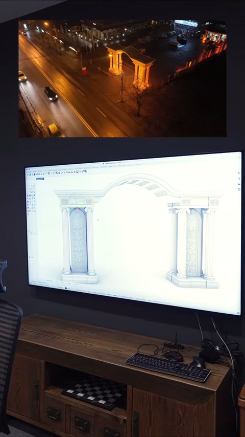 Lo schermo ampio mostra la progettazione della porta ad arco circondata da colonne.
