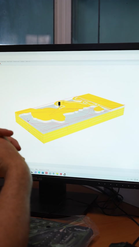 Yellow digital model previews the custom relief panel structure