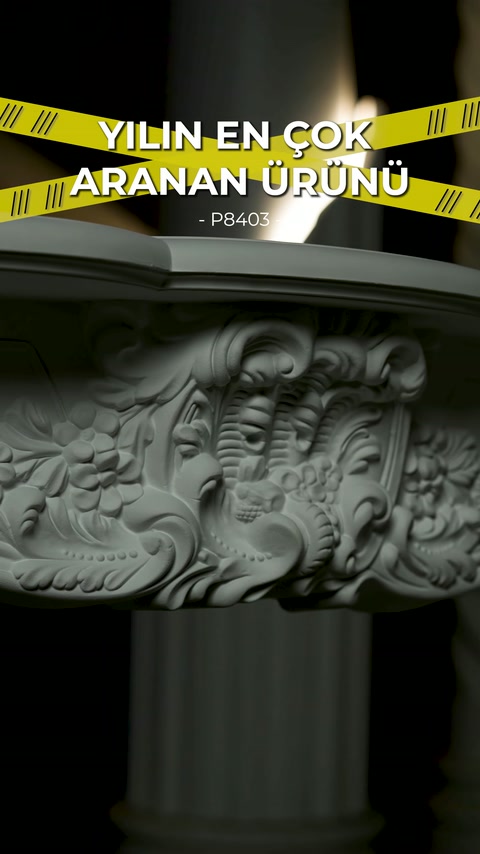 Acanthus leaves and curved ornaments on upper fireplace section captured in close detail.