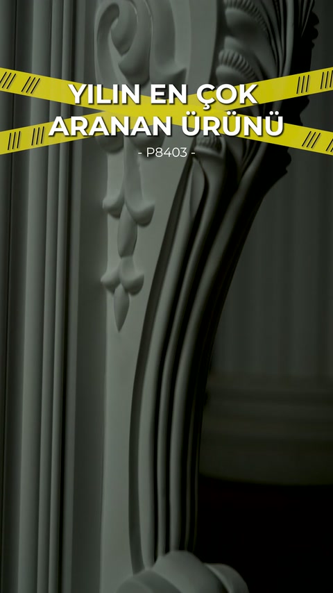 Fluted arch and small leaf embossments framing fireplace opening shown in detail.
