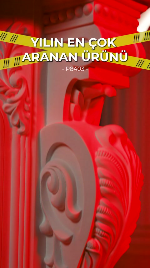 Circular side motif of fireplace surround emphasized under red lighting.
