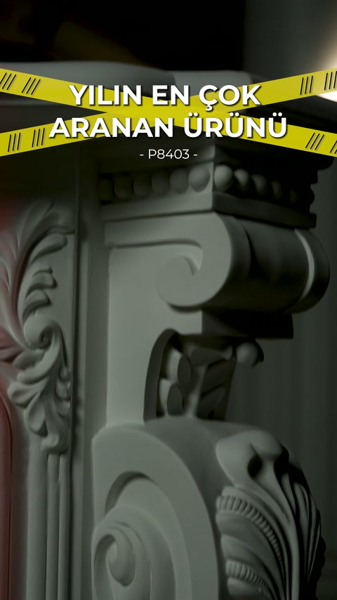 Bead detailing, volutes and leaf ornaments visible at upper fireplace corner.