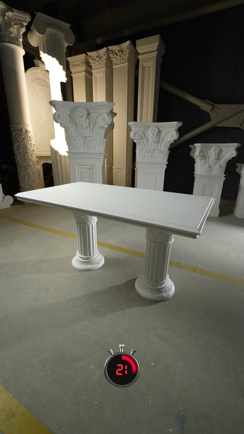 Decorative pedestal tables stand among classical columns and carved capitals.