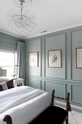 Polyurethane Wall Molding Bedroom with Modern Classic Decorative Design <h2>Modern Classic Atmosphere Through Polyurethane Details</h2><p>Polyurethane wall <strong>molding</strong> is an excellent technique for introducing structure and depth into an interior space without sacrificing modern fluidity. In this bedroom, elongated rectangular frames create visual rhythm, defining the walls with precision while maintaining a balanced composition. Their muted sage-grey hue enhances serenity, making the space feel cohesive and inviting.</p><p>Between each frame rests framed botanical art, which softens the structured geometry. These pieces complement the sharper <strong>architectural</strong> lines of the molding with organic motifs, producing a dialogue between nature and geometry. Such use of contrast is a hallmark of the <strong>modern classic</strong> aesthetic, where discipline and elegance merge.</p><p>The chandelier exemplifies another key element: playful contrast. Its collection of glass spheres forms a sculptural centerpiece. These rounded forms stand in deliberate opposition to the squared wall outlines, making the room feel both structured and dynamic. The chandelier employs repetition in its design, echoing historic decorative practices that date back to neoclassical interiors where symmetry and pattern dominated visual order.</p><p>Polyurethane molding also references classical design roots. Historically, wall panels and trims were sculpted from plaster or wood to achieve a sense of grandeur. Today, polyurethane provides the same <strong>decorative</strong> impact with lighter and more adaptable application, keeping authentic design traditions alive while aligning with contemporary building demands.</p><p>The room balances its structural qualities with a delicate approach to comfort. Soft drapery, crisp bedding, and a minimal nightstand bring in modern usability to contrast ornate detailing. Together, they demonstrate how <strong>interior design</strong> can achieve a timeless atmosphere rooted in classical craftsmanship but adapted to the expectations of modern living.</p>

<p>This bedroom demonstrates a striking balance between <strong>polyurethane molding</strong> and a timeless modern classic sensibility. The rectangular wall frames introduce symmetry. The muted sage tones produce a calm backdrop. Botanical artworks add organic contrast. A chandelier of glass spheres enhances dynamic energy. The bedding ensures freshness. Burgundy accents bring warmth. The muted textures emphasize harmony. The wall structure references classical traditions. Polyurethane updates these motifs for modern use. The chandelier anchors the room with sculptural presence. Interior layering provides balance. The wooden bench adds grounding. Drapery softens geometry. This design merges tradition and comfort. The overall impression is refined and timeless.</p>