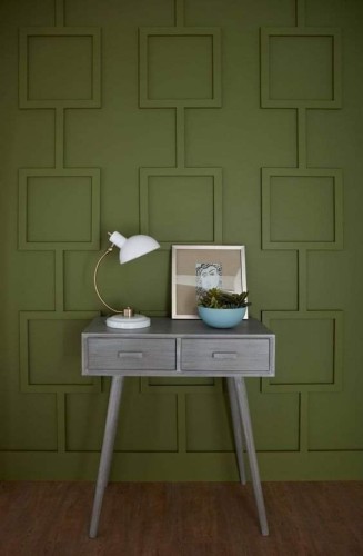 Modern Classic Decoration with Polyurethane Wall Molding in Geometric Design <h2>Geometric Sophistication with Polyurethane Wall Molding</h2><p>The integration of <strong>polyurethane</strong> wall molding into modern interiors allows a unique balance of elegance and structure. In this example, an <strong>olive green</strong> backdrop is accentuated by geometric molding, composed of evenly spaced relief squares connected by subtle vertical lines. This consistency creates a rhythmic aspect that visually elongates the wall.</p><p>The square motif recalls classical architectural traditions, where framed wall panels were historically used to symbolize order and refinement. In a modern interpretation, these clean, straight forms soften the rigidity of the wall and develop a welcoming atmosphere suitable for both homes and workspaces.</p><h2>Functional Elegance in Furnishing</h2><p>The wall is complemented by a sleek console with a <strong>mid-century</strong> aesthetic, defined by its light gray tone and tapered legs. A white desk lamp with a curved golden stem, alongside a framed artistic sketch and a pastel-toned ceramic bowl with plants, adds depth to the vignette. The harmony of natural wood flooring and muted decorative accents ensures the structural wall feature remains the focal element.</p><h2>Design Inspiration for Diverse Interiors</h2><p>Whether applied in living rooms, hallways, or office reception areas, the square panel motif allows versatile interpretations. The repetitive geometric composition ensures visual impact without overwhelming the space. The subtle play of shadow created by the raised moldings emphasizes the <strong>modern classic</strong> balance and allows light to enrich the wall’s depth.</p><p>This technique offers a practical and aesthetic solution for interior upgrades, showcasing how <strong>geometric</strong> detailing adds architectural character while maintaining timeless simplicity.</p>

<p>This interior design highlights the power of <strong>polyurethane</strong> in creating refined decorative solutions. The use of large-scale wall molding generates a sense of rhythm through a grid of geometric squares. Vertical alignment of square frames enhances both balance and order. An olive-toned backdrop provides warmth and visual depth. A gray console with tapered legs connects modern furniture to the structured wall. Decorative objects are carefully placed for subtle harmony. The inclusion of a curved white lamp adds functional lighting without disturbing symmetry. A framed artwork introduces an artistic layer to the room. A bowl in soft pastel colors ensures contrast against the wall. The raised relief squares cast gentle shadows, bringing dimensionality. This design subtly references historic uses of framed wall panels. At the same time, it adapts them into a contemporary vocabulary. The technique perfectly bridges <strong>modern classic</strong> interiors. The consistency avoids visual overcrowding while staying impactful. Ultimately, it demonstrates how <strong>geometric</strong> detailing enhances both homes and workplaces with clarity.</p>