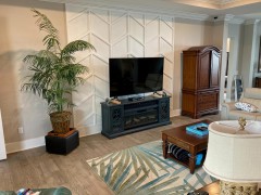 Polyurethane Molding with Geometric TV Wall in a Modern Classic Living Room Modern Classic TV Wall with Polyurethane MoldingIn this modern classic living room design, the focal point is a striking TV wall enhanced 