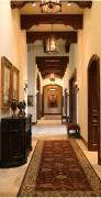 Rustic Classic Corridor with Ornamental Wood Details and Elegant Lighting Rustic Wooden ElementsThe corridor design emphasizes the beauty of wooden beams with sculpted curves and layered support 